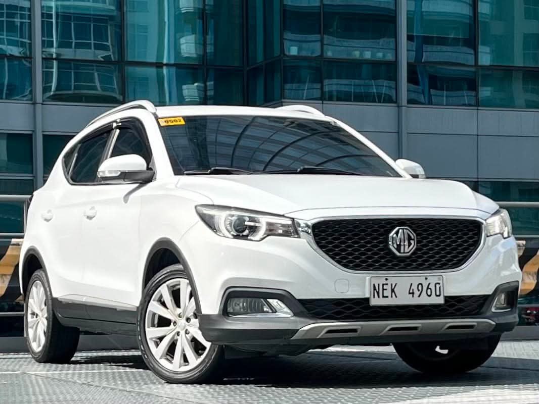 MG ZS (Category: Used Cars) located in Makati City. Submitted by maby_latido05 (Listing ID 1456712129, Image 3). Description: 2022 MG ZS Style 1.5 Gas AT‼️🔥 ALL IN DP Php60K! For Financing Approval 2yrs: P26,749 3yrs: P19,327 4yrs: P16,026 🔰Mileage: 43K KM ✅NO MILEAGE TAMPERING GUARANTEED✅ ➡️2nd Owner ➡️Push start ➡️Alloy Mags ➡️Airbag ➡️Rear Camera ➡️Leather Seat ➡️5 seater ➡️Foglight ➡️💯% Not Flooded ➡️Mechanic Inspected 👨‍🔧 ➡️PNP Verified