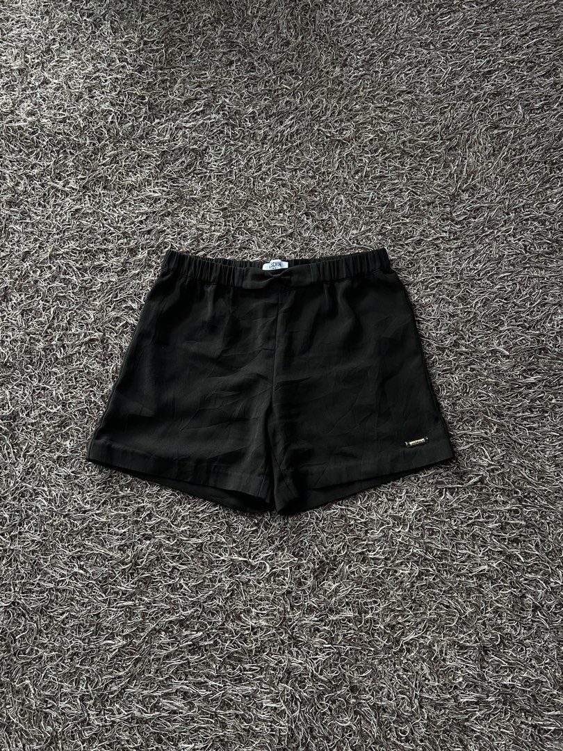 Moschino Shorts (Category: Shorts) located in Miagao. Submitted by mjhandpicked (Listing ID 1456779605, Image 1). Description: Moschino Teen Short Color: Black ***authentic; elastic waistband with bow details and metal Moschino logo plate Size: Can fit XS-SM Waistline: 26in-30in Length: 13in Inseam: 4.5in Condition+Color: 10/10 Please no rush shipping unless available😊 MOP: GCash MOD: J&T Express Location: Iloilo Province.