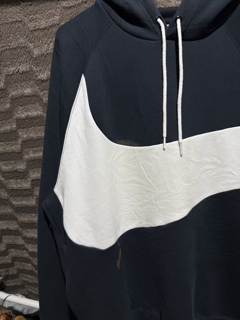 Nike big swoosh hoodie (Category: Coats, Jackets and Outerwear) located in Bulacan. Submitted by OG_Domsthrift (Listing ID 1456642763, Image 3). Description: Large On tag 25x28 Issue: zerox stain, need wash Color rate:9.5/10 .