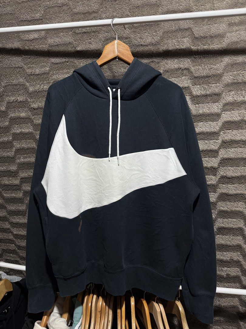 Nike big swoosh hoodie (Category: Coats, Jackets and Outerwear) located in Bulacan. Submitted by OG_Domsthrift (Listing ID 1456642763, Image 1). Description: Large On tag 25x28 Issue: zerox stain, need wash Color rate:9.5/10 .