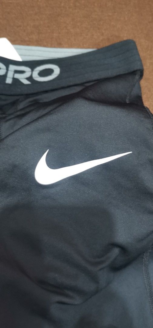 Nike Pro Dri-FIT Compression Tights Black (Category: Activewear) located in Cavite. Submitted by nehlfab08 (Listing ID 1456761575, Image 3). Description: - Black Nike Pro Dri-FIT compression tights - Tight fit designed for optimal performance - Made in Jordan - Ideal for workouts, training, and sports - Features a comfortable elastic waistband with Nike Pro branding - Signature white Nike swoosh logo on the leg.