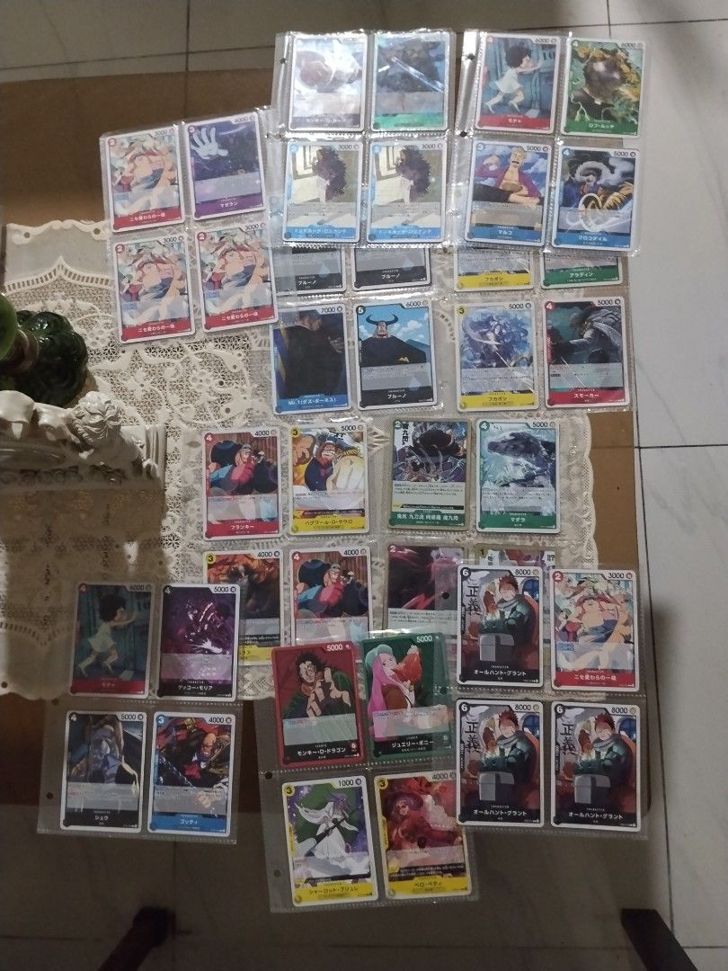 one piece cards set (Category: Game Gift Cards & Accounts) located in Manila. Submitted by cruzivanpatrick (Listing ID 1456611793, Image 2). Description: one piece card set only back to back po me laman check nalang sa meet up pm meet up lrt 1 abad santos station deliver kayo mag book g cash shipping payment first lbc or jrs kung me app kayo pang book kayo po mag book mas mura po salamat.