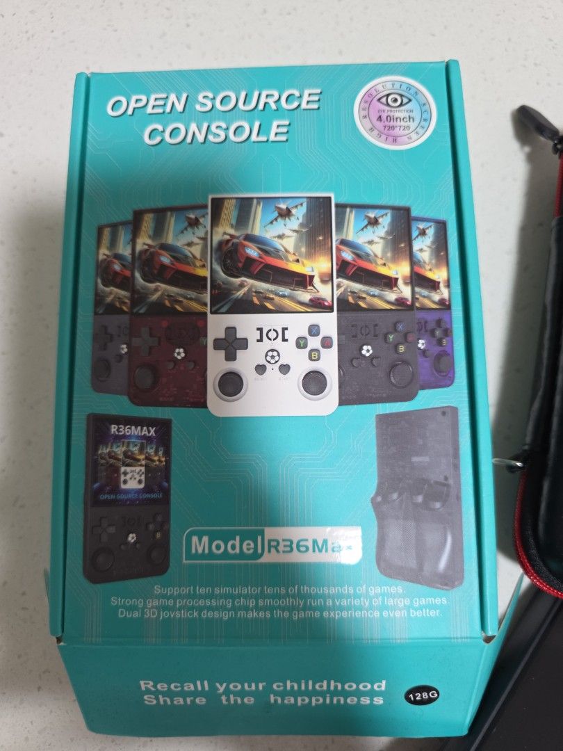 Open Source Console (Category: Remote Control Toys) located in Singapore. Submitted by brightdeer8018 (Listing ID 1456609664, Image 2). Description: - R36S Open Source Handheld Gaming Console - Comes with protective carrying case - Features dual 3D joysticks for enhanced gameplay - Perfect for reliving childhood gaming memories - comes with original box and pouch.