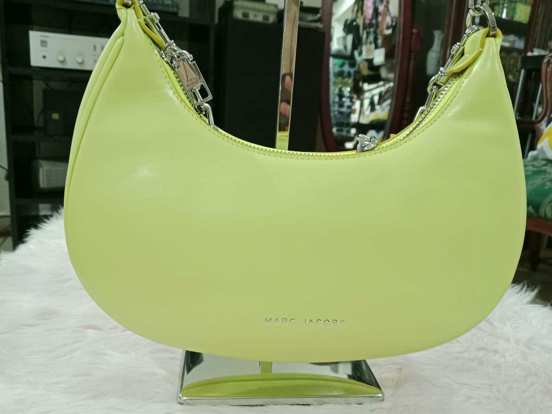 Original Marc Jacobs Yellow Shoulder Bag (Category: Luxury Bags & Wallets) located in Pasig City. Submitted by janalopez904 (Listing ID 1456764731, Image 2). Description: - Original Marc Jacobs shoulder bag - Eye-catching bright yellow color - Originally purchased for 10,000 PHP - Selling for only 3,500 PHP - Comes with original dust bag and tags - Ideal for casual outings.