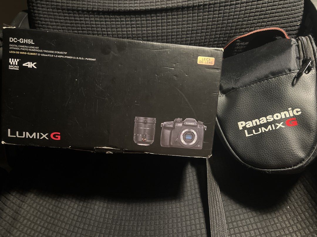 Panasonic Lumix DC-GH5L Digital Camera with Lens Kit (Category: Cameras) located in Quezon City. Submitted by Nexus (Listing ID 1456764775, Image 1). Description: - Panasonic Lumix G DC-GH5L Digital Camera - Includes Leica DG Vario-Elmarit 12-60mm Lens - Records stunning 4K video - Comes with a Panasonic Lumix branded pouch - Ideal for both photography and videography enthusiasts Negotiable, bought for 120k+ BARELY used Issue: Box is worn out, th