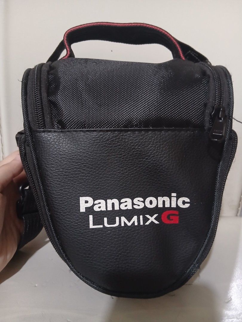 Panasonic Lumix G GH5L Digital Camera Lens Kit (Category: Cameras) located in Quezon City. Submitted by puchi.cat (Listing ID 1456683943, Image 2). Description: - Panasonic Lumix GH5L digital camera body - Leica DG Vario-Elmarit 12-60mm lens - Panasonic Lumix G camera bag - Original box and packaging included - Ideal for high-quality 4K video and photography original price is 122k, selling it for 99k (negotiable). Only used a couple of times. .