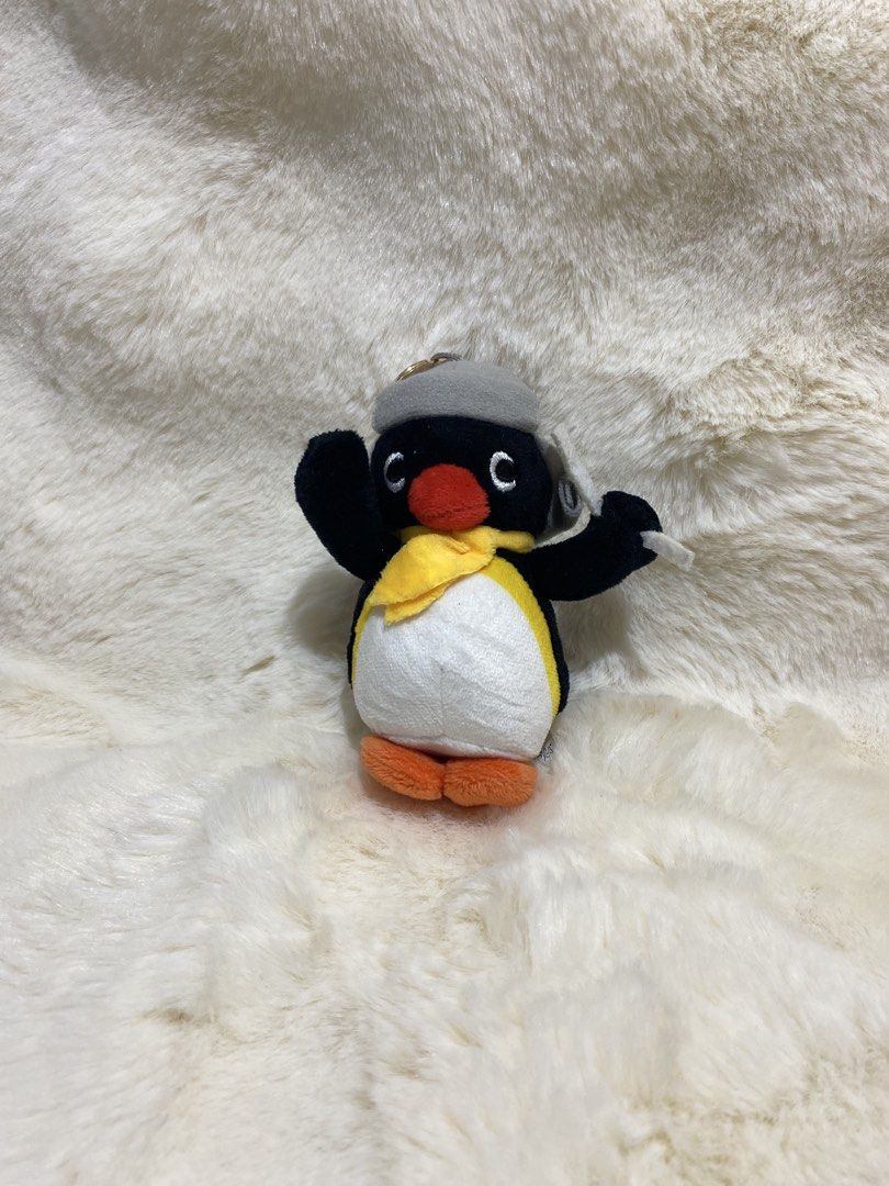 Pingu Penguin Plush charm Keychain (Category: Plushies & Soft Toys) located in Kalibo. Submitted by ollie_stuffshop (Listing ID 1456650070, Image 1). Description: Before you send your inquiries: ❗️Last Price is already posted ❗️Manage your expectations, WYSIWYG ❗️May need washing ❗️Shipping day is every Sunday - Adorable Pingu penguin plush keychain - Features a cute grey hat and yellow scarf - Made of soft plush material - Comes with a convenien