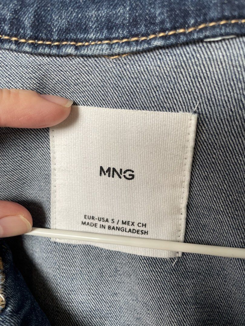 Pre-loved Jacket#1 MANGO MNG Blue Denim Jacket Size S (Category: Coats, Jackets and Outerwear) located in Paranaque City. Submitted by ccprelovedclothes (Listing ID 1456677131, Image 2). Description: NOTE: Buyer to shoulder cost of pickup or delivery. - Classic blue denim jacket from MNG - With pockets - Button-up front and button cuffs - Made in Bangladesh - Perfect staple piece for easy styling.