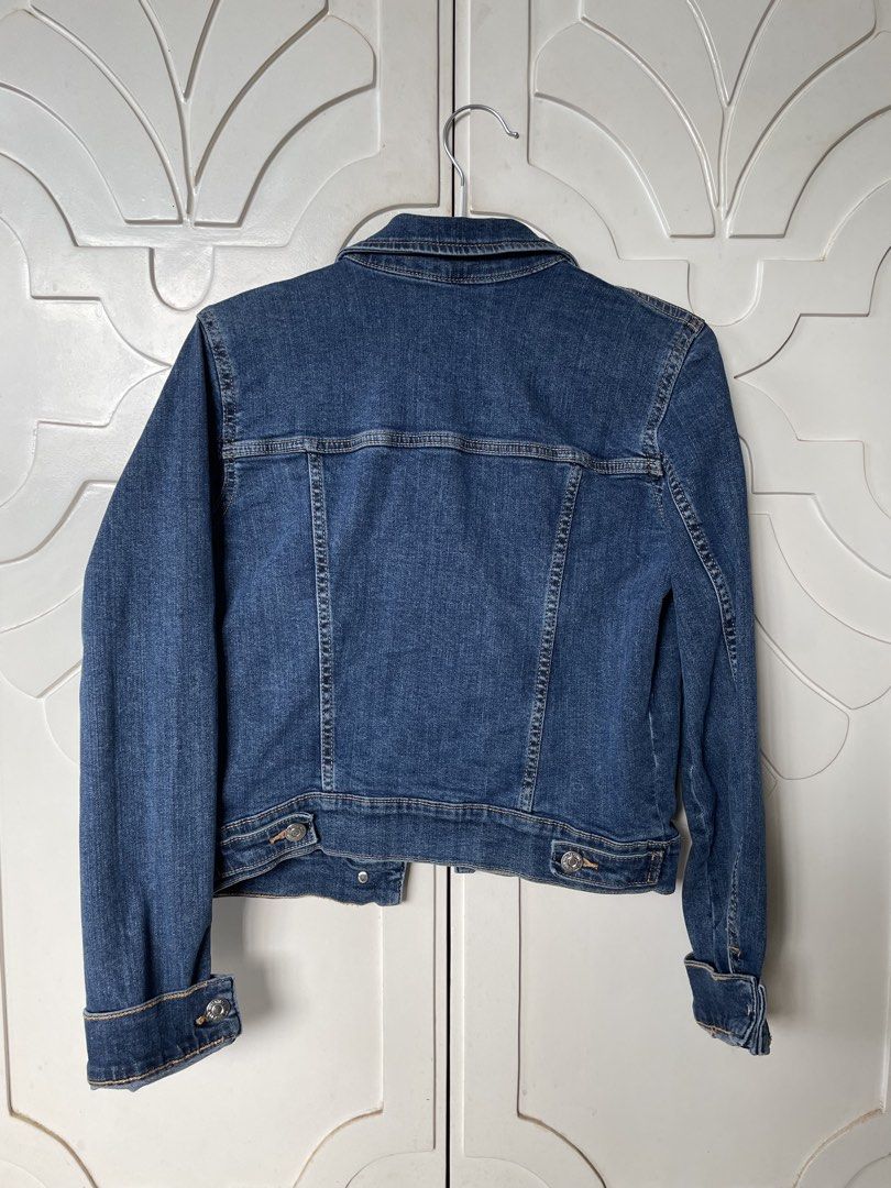Pre-loved Jacket#1 MANGO MNG Blue Denim Jacket Size S (Category: Coats, Jackets and Outerwear) located in Paranaque City. Submitted by ccprelovedclothes (Listing ID 1456677131, Image 3). Description: NOTE: Buyer to shoulder cost of pickup or delivery. - Classic blue denim jacket from MNG - With pockets - Button-up front and button cuffs - Made in Bangladesh - Perfect staple piece for easy styling.