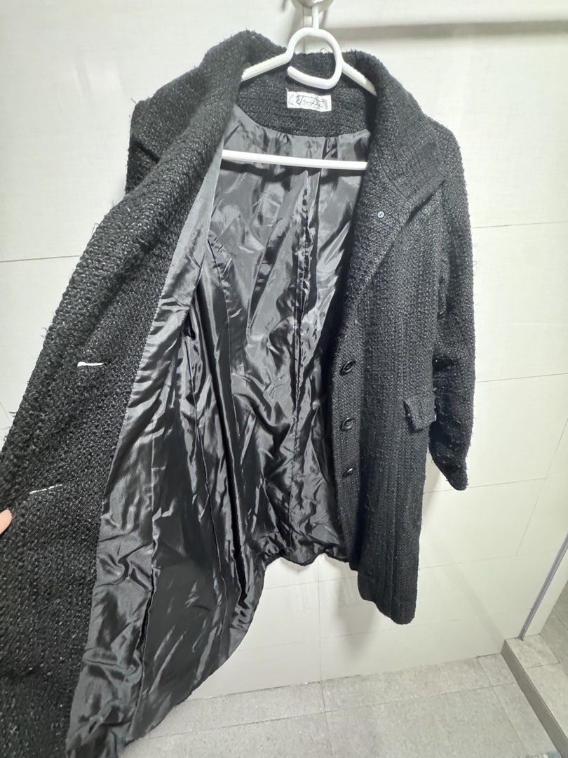 Preloved Wool Trench coat for women (Category: Coats, Jackets and Outerwear) located in Las Pinas. Submitted by jescerrie.adajar (Listing ID 1456638475, Image 2). Description: Preloved Trench coat for women -Black wool trench coat for women -with lining -Medium size -Dimensions : Shoulders = 17 inches Length = 38 inches -RFS : Decluttering.
