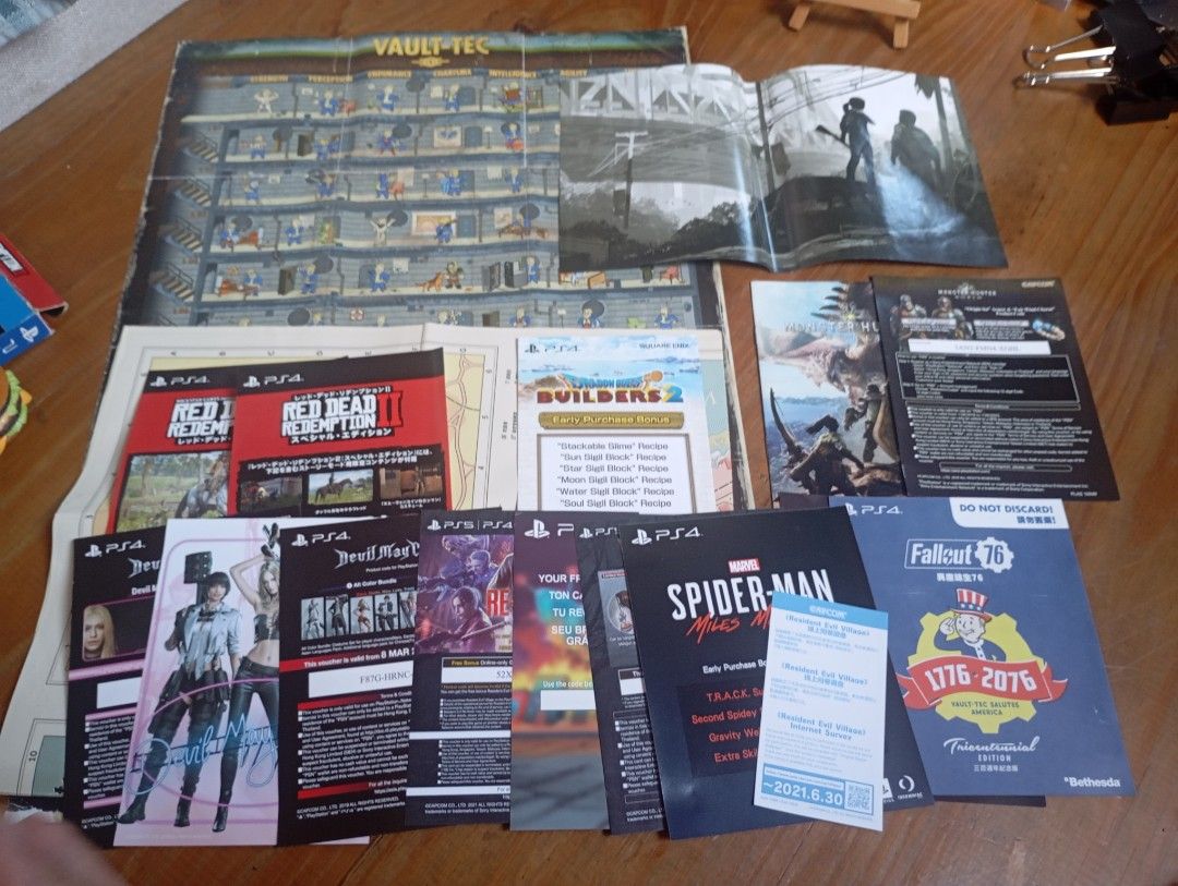 PS4 Game Inserts: Fallout 76, Spider-Man, Red Dead Redemption 2 & More (Category: PlayStation) located in Valenzuela. Submitted by hyrotitania (Listing ID 1456675559, Image 2). Description: - Collection of PlayStation 4 game inserts and booklets. - Titles include: Fallout 76, Marvel's Spider-Man Miles Morales, Red Dead Redemption 2, Devil May Cry 5, and Builders 2. - Also includes larger posters/maps from Vault-Tec and other games. - Ideal for co
