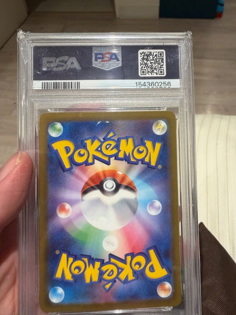 PSA Graded Pokemon Card - 154360256 (Category: Graded Singles) located in Caloocan City. Submitted by cg031 (Listing ID 1456614902, Image 2). Description: - PSA Graded Pokemon Card - Grading Number: 154360256 - Card Back Features: Pokemon Logo & Pokeball - Perfect for Pokemon collectors! - Please check photos for detailed condition..