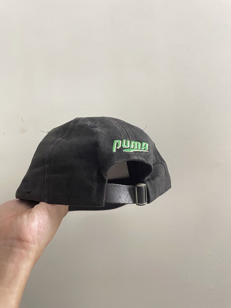 Puma Cap (Category: Cap & Hats) located in Johor Bahru. Submitted by llam.az (Listing ID 1456766739, Image 3). Description: Puma Cap with leather strap Color : Black / Green Condition: 9/10 Selling as is. You see what you get. Postage: DFOD .