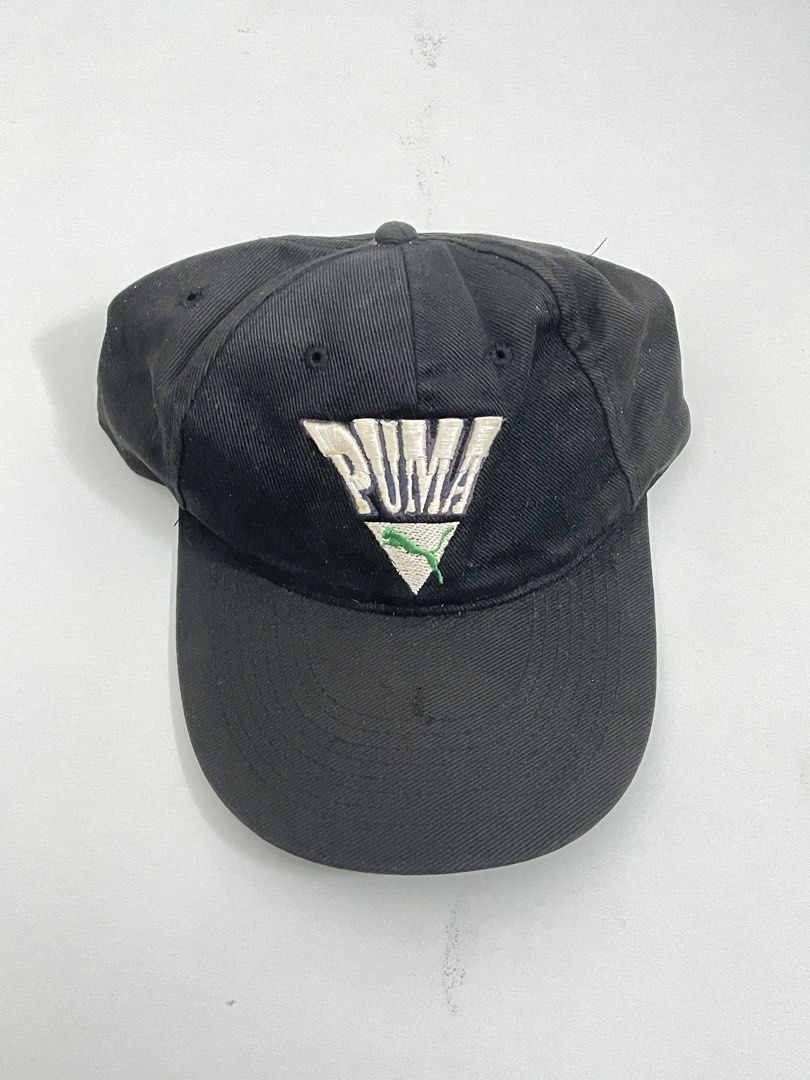 Puma Cap (Category: Cap & Hats) located in Johor Bahru. Submitted by llam.az (Listing ID 1456766739, Image 1). Description: Puma Cap with leather strap Color : Black / Green Condition: 9/10 Selling as is. You see what you get. Postage: DFOD .