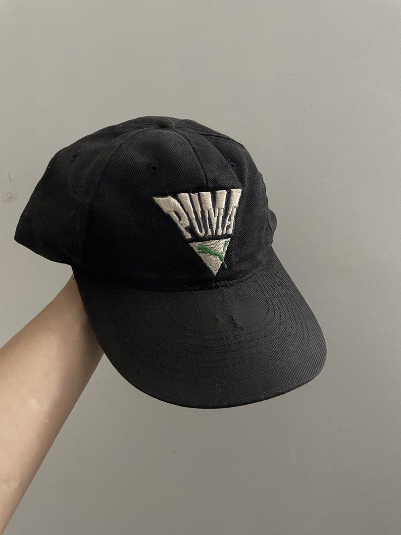 Puma Cap (Category: Cap & Hats) located in Johor Bahru. Submitted by llam.az (Listing ID 1456766739, Image 2). Description: Puma Cap with leather strap Color : Black / Green Condition: 9/10 Selling as is. You see what you get. Postage: DFOD .