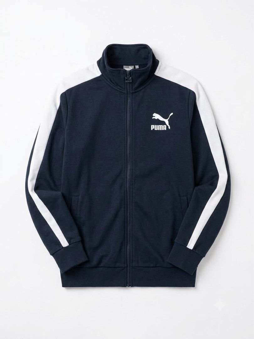 Puma Track Jacket Navy Blue White Stripes Size XL (Category: Coats, Jackets and Outerwear) located in Manila. Submitted by andrada_jamie (Listing ID 1456712555, Image 1). Description: 29x23 - Classic Puma track jacket - Color: Navy blue with white stripes on sleeves and shoulders - Full zip closure - Two side pockets - Ideal for casual wear or sports - Size: XL.