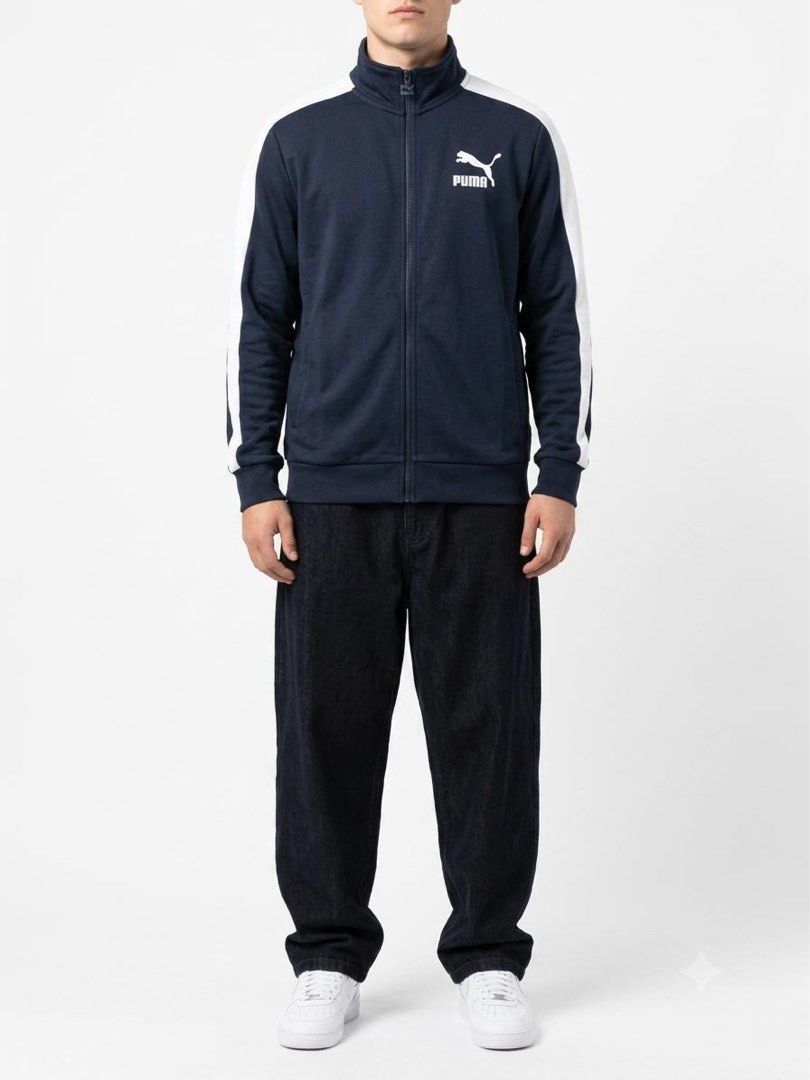 Puma Track Jacket Navy Blue White Stripes Size XL (Category: Coats, Jackets and Outerwear) located in Manila. Submitted by andrada_jamie (Listing ID 1456712555, Image 2). Description: 29x23 - Classic Puma track jacket - Color: Navy blue with white stripes on sleeves and shoulders - Full zip closure - Two side pockets - Ideal for casual wear or sports - Size: XL.