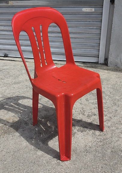 Red Plastic Stackable Chair (Category: Chairs) located in Shah Alam. Submitted by atinatirah1 (Listing ID 1456738244, Image 1). Description: - Red plastic chair - Stackable design - Durable and sturdy construction - Ideal for events or extra seating - Minor cosmetic scuffs from use - Pick up only.