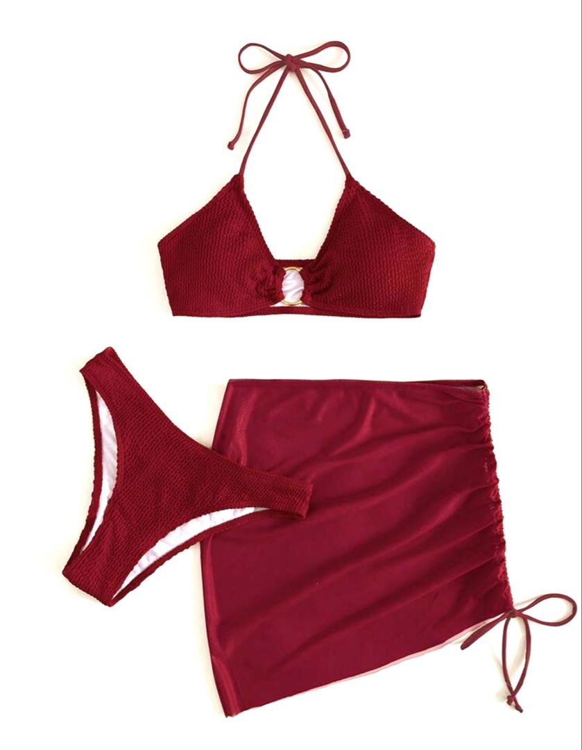 Red Textured Bikini Set with Mesh Skirt (Category: Bikinis & Swimsuits) located in Santa Maria. Submitted by seapuff (Listing ID 1456755392, Image 1). Description: - cute red textured bikini set👙🏖️ - size: s (but can fit up to medium) - halter neck top with gold ring detail - high-waisted bottoms - w/ matching red mesh skirt (can be used as cover up, for conservative girlies✨) - skirt has adjustable side drawstring - only worn thrice (still in 