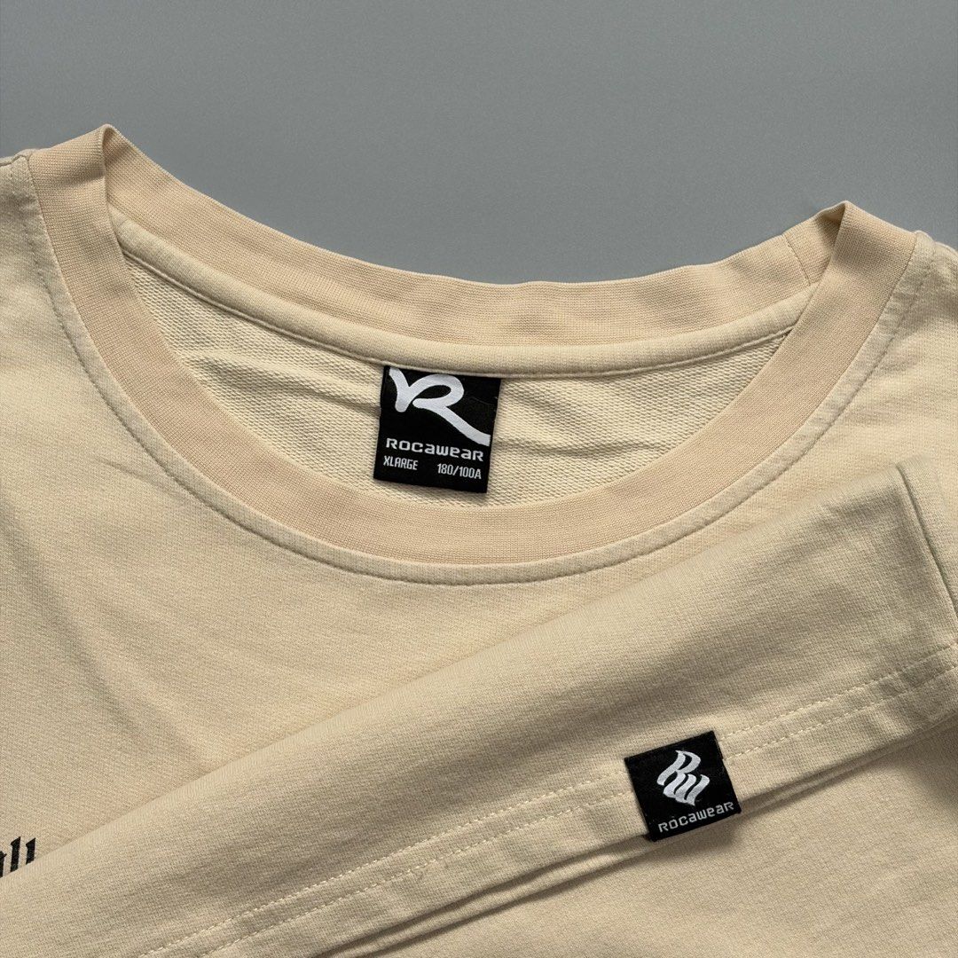 (Sale)Rocawear (Category: Activewear) located in Cavite. Submitted by onebeancent (Listing ID 1456619100, Image 3). Description: 🔘Roc.4wear Tee Size: XL frame Dimension: 24" Width | 28" Length Color: Cream Color Rate: 9.5/10 Issue: None Condition: Excellent Before: 380php Now: 280php Additional Shipping Fee (J&T Small Pouch) 75php Luzon 100php visayas 120php mindanao.