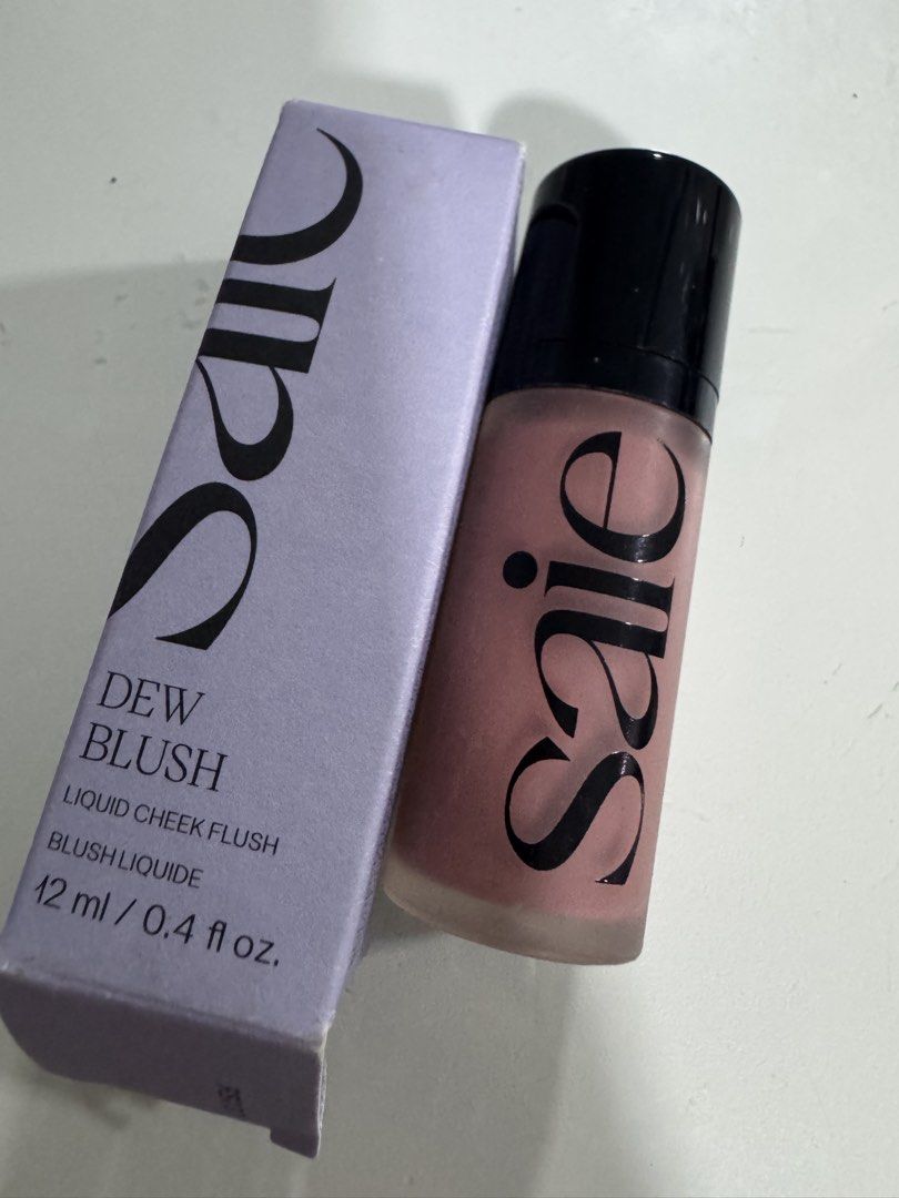 Saie Dew Blush Liquid Cheek Flush - Lady (Category: Makeup) located in Manila. Submitted by decluterthings888 (Listing ID 1456619434, Image 2). Description: - Saie Dew Blush - Shade: Lady - Type: Liquid cheek flush - Size: 12 ml / 0.4 fl oz - Includes original box - Perfect for a natural, healthy flush.