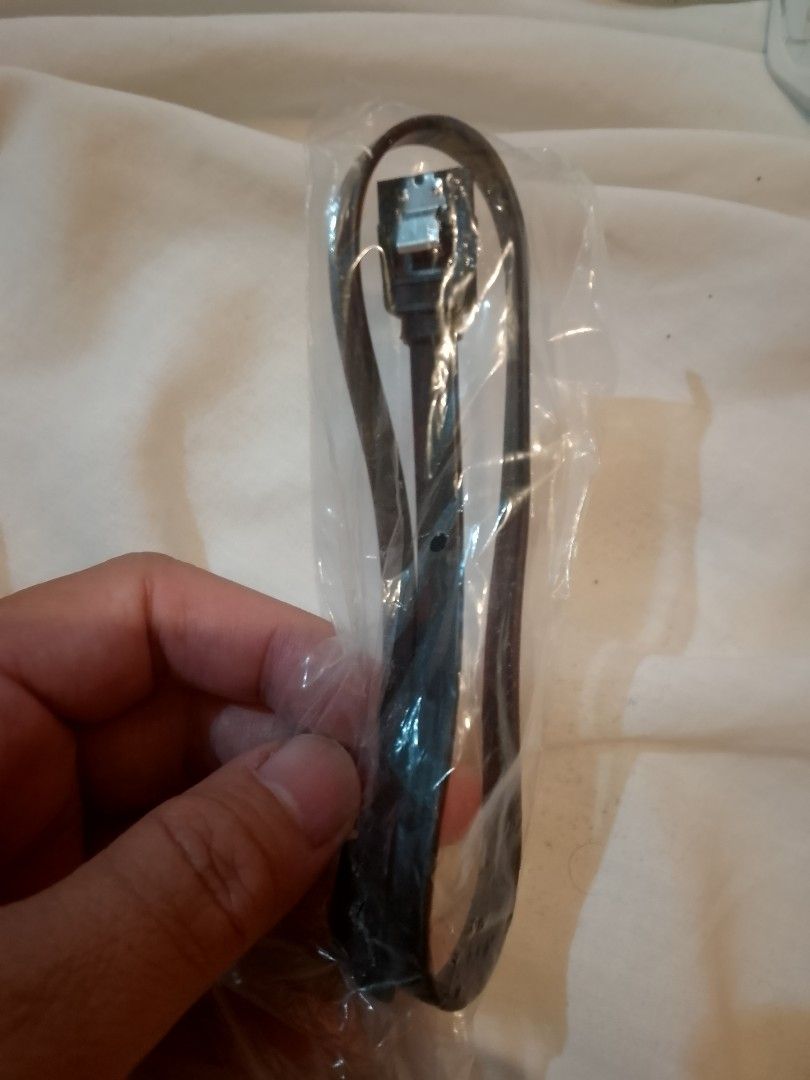 SATA cable (Category: Cables & Adaptors) located in Manila. Submitted by keendeer.6c83cc (Listing ID 1456665622, Image 1). Description: brand new SATA cable .