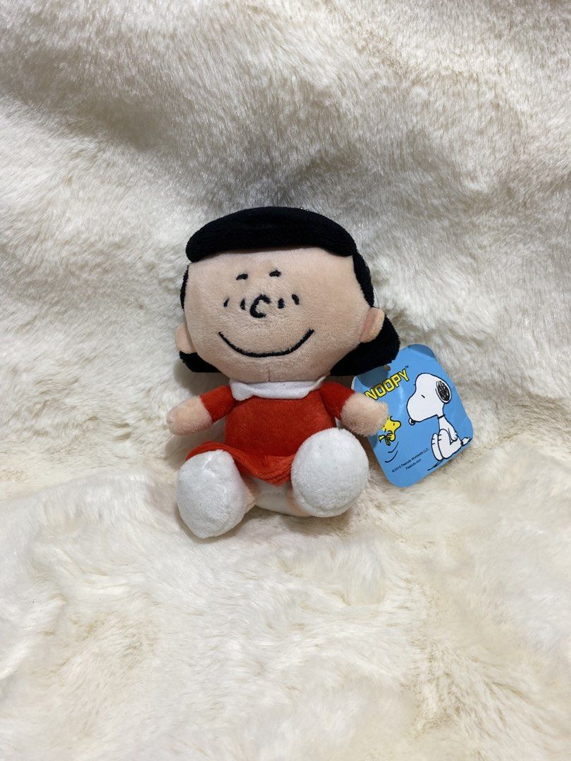 Snoopy Lucy Van Pelt Plush charm keychain (Category: Plushies & Soft Toys) located in Kalibo. Submitted by ollie_stuffshop (Listing ID 1456631457, Image 1). Description: Before you send your inquiries: ❗️Last Price is already posted ❗️Manage your expectations, WYSIWYG ❗️May need washing ❗️Shipping day is every Sunday - Adorable Lucy Van Pelt plush toy from Snoopy. - Features her classic red dress. - Brand new with tag still attached. - Ideal for 