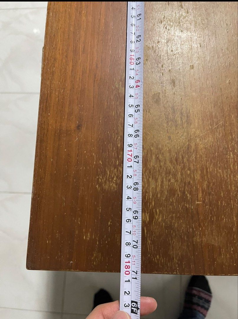 Solid Wooden Dining Table (Category: Tables & Sets) located in Singapore. Submitted by flynow168 (Listing ID 1456748022, Image 2). Description: - Solid wooden dining table - Dimensions: Approx. 180cm (L) x 75cm (W) x 75cm (H) - Shows some signs of wear consistent with use - Sturdy wooden legs - Perfect for family meals or as a workspace Pls arrange your delivery and collection. Negotiable for fast deal .