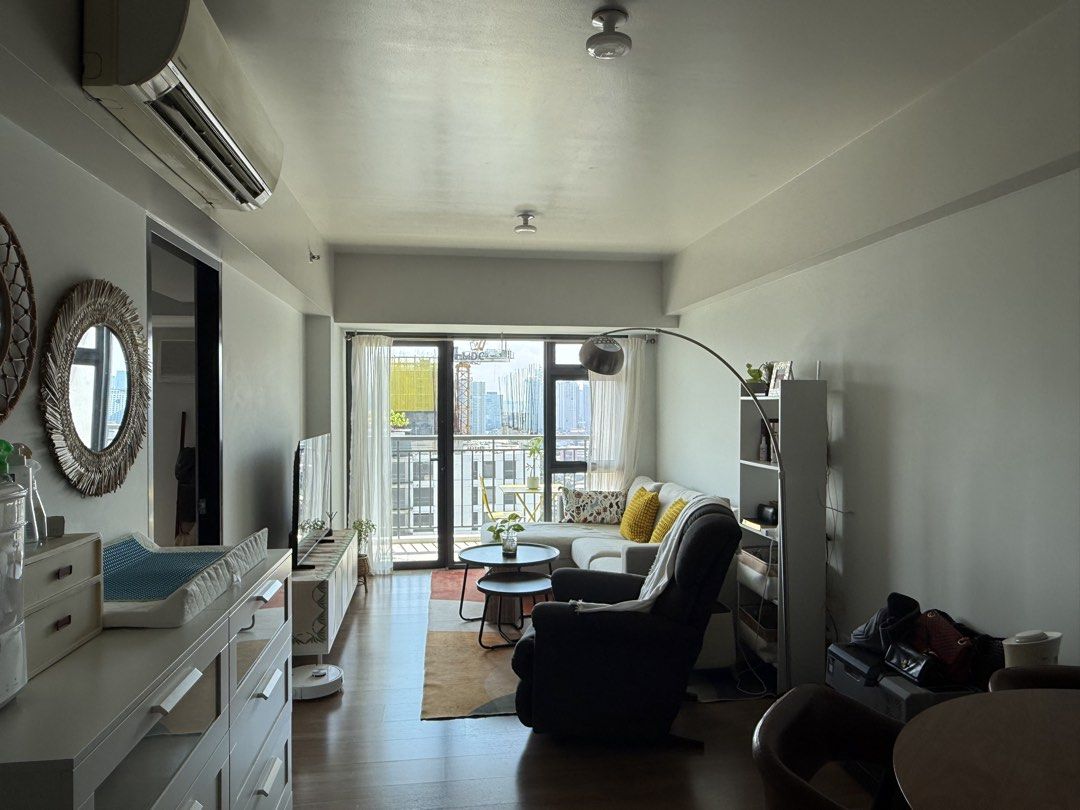 Solstice Tower 1, 1 BR for lease (Category: Apartments & Condos) located in Mandaluyong City. Submitted by lulubelle86 (Listing ID 1456660730, Image 1). Description: A bright and beautifully furnished 1-Bedroom home featuring an open layout & balcony with a beautiful view overlooking the river and football field. 59 sqm 27th floor Parking at 7th floor Fully furnished @ P50K/mo. (inc assoc dues) Move in with ease that includes • Cozy living room w