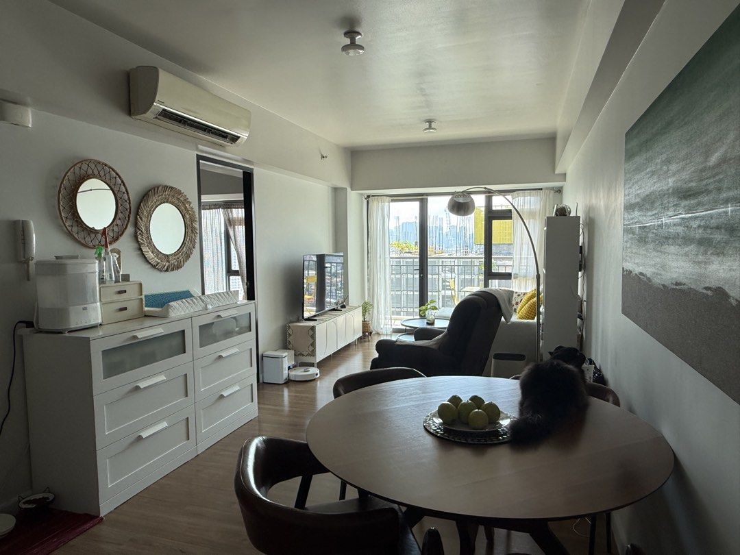 Solstice Tower 1, 1 BR for lease (Category: Apartments & Condos) located in Mandaluyong City. Submitted by lulubelle86 (Listing ID 1456660730, Image 3). Description: A bright and beautifully furnished 1-Bedroom home featuring an open layout & balcony with a beautiful view overlooking the river and football field. 59 sqm 27th floor Parking at 7th floor Fully furnished @ P50K/mo. (inc assoc dues) Move in with ease that includes • Cozy living room w