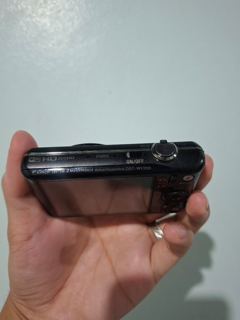 Sony wx200 (Category: Cameras) located in Dagupan City. Submitted by gadgets_by_pxtrade (Listing ID 1456769385, Image 2). Description: 📷 Sony Cyber-shot DSC-WX200 🧺 SALE: ₱11,999 + sf — slightly negotiable Features: Compact & stylish digicam 18.2 MP Exmor R CMOS sensor 10x Optical zoom Built-in Wi-Fi Full HD video recording Body condition: 9/10 — very good condition and could pass as brand new. No scratches, dents, or major signs of usage. With
