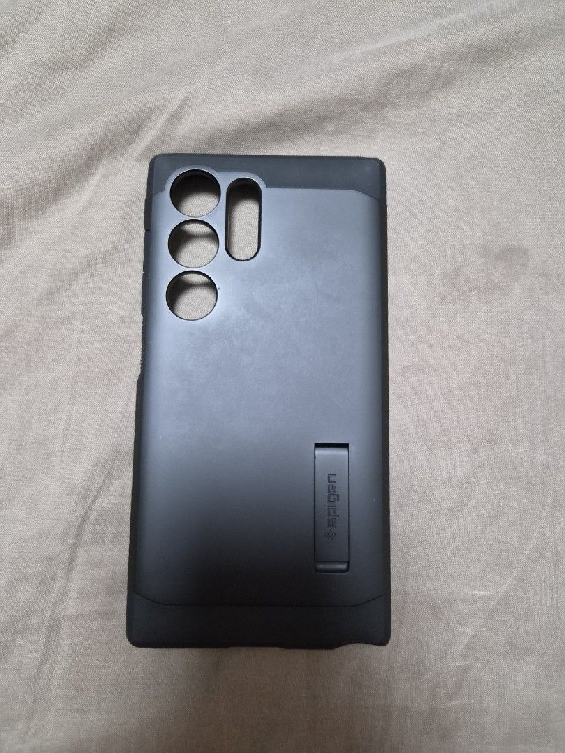 Spigen Magsafe Case for Samsung S24 Ultra (Category: Cases & Sleeves) located in Caloocan City. Submitted by hotstuffcollections (Listing ID 1456648394, Image 1). Description: - Brand: Spigen - Compatible with: Samsung S24 Ultra - Feature: Magsafe compatible - Color: Matte Black - Design: Reinforced corners for enhanced drop protection - Condition: Excellent, like new.
