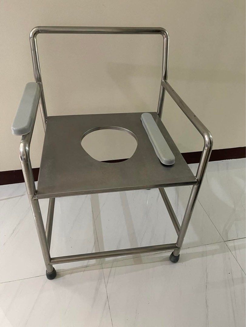 Stainless Steel Commode Chair with Armrests (Category: Medical Supplies & Tools) located in Mandaluyong City. Submitted by user4759642 (Listing ID 1456715195, Image 1). Description: - Durable stainless steel construction - Built-in armrests for enhanced support - Spacious seat opening for comfort - Sturdy metal frame with non-slip rubber leg stoppers - Excellent for individuals needing mobility assistance - Height from floor to knee 19 inch - wid