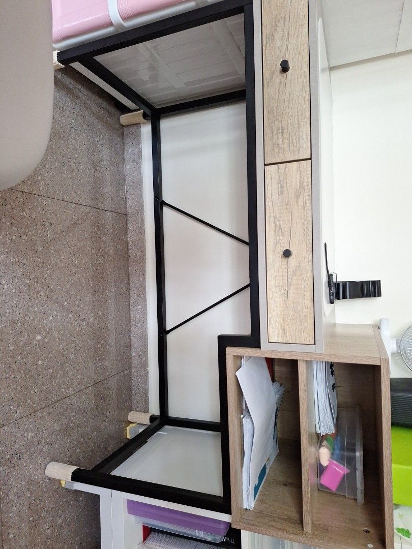 Study table (Category: Tables & Sets) located in Singapore. Submitted by angie612 (Listing ID 1456629990, Image 1). Description: - Light wood grain finish study desk - Two drawers for storage - Attached shelving unit on the right - Sturdy black metal legs - Ample surface and storage space - Minor scuffs on leg protectors.