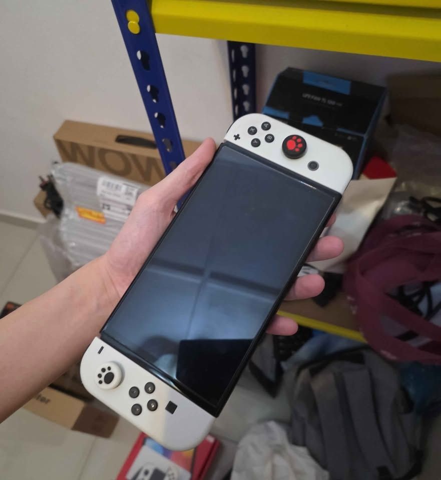 Switch oled (Category: Nintendo) located in Johor Bahru. Submitted by zhezheng999 (Listing ID 1456767698, Image 1). Description: Switch oled Good condition Cod jb.