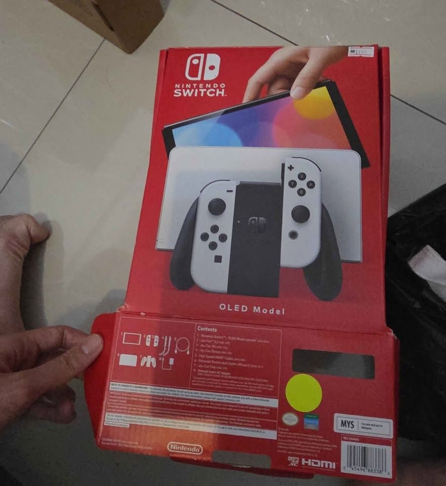 Switch oled (Category: Nintendo) located in Johor Bahru. Submitted by zhezheng999 (Listing ID 1456767698, Image 2). Description: Switch oled Good condition Cod jb.