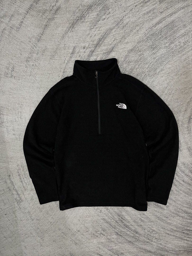 The North Face Black Fleece Half Zip Pullover (Category: Coats, Jackets and Outerwear) located in Manila. Submitted by lesterrrrrr (Listing ID 1456731272, Image 1). Description: - Classic black fleece pullover from The North Face - Features a half-zip neckline - Iconic embroidered logo on the chest - Made from soft, warm fleece material - Ideal for layering in cold weather or casual wear - Easy to style and comfortable.