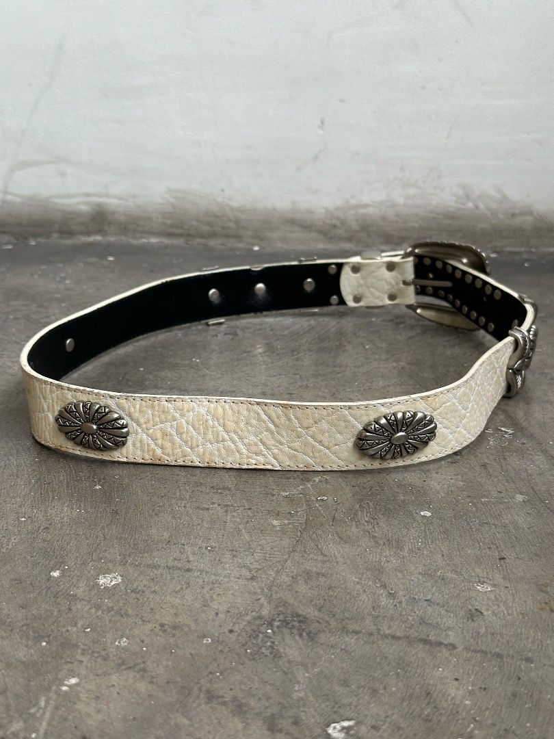 Tornado Mart - Studded Western Belt (Category: Belts) located in Manila. Submitted by graymatter_ (Listing ID 1456702953, Image 2). Description: Tornado Mart - Studded Western Belt Tagged Size: L Condition: 9/10 Flaws: Yellowing of Leather Body Dimensions Length: 93.5cm Width: 3.3cm.
