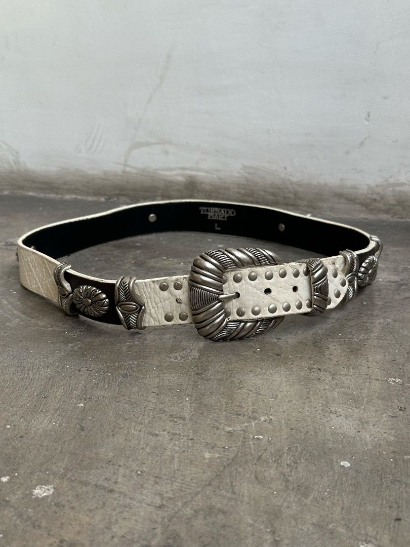 Tornado Mart - Studded Western Belt (Category: Belts) located in Manila. Submitted by graymatter_ (Listing ID 1456702953, Image 1). Description: Tornado Mart - Studded Western Belt Tagged Size: L Condition: 9/10 Flaws: Yellowing of Leather Body Dimensions Length: 93.5cm Width: 3.3cm.