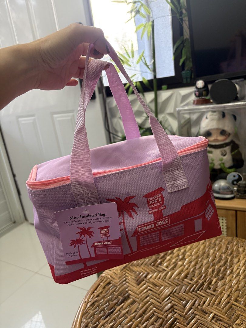 trader joes mini insulated bag (Category: Other Kitchenware & Tableware) located in Cavite. Submitted by mylittlechicshop (Listing ID 1456692750, Image 2). Description: Trader Joe's Mini insulated bag ✅1 pc only Great for lunches, travel & outdoor activities. Add ice pack to help keep food cold. holds up to 1.5 gallons High density fabric for extra protection 💯 guaranteed original from 🇺🇸 on hand and ready to ship.