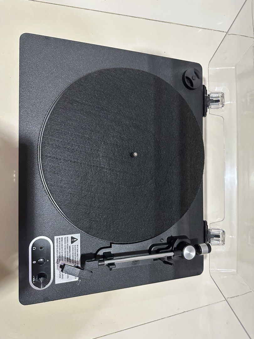 Turntable Record Vinyl Player with Dust Cover (Category: Other Audio Equipment) located in Quezon City. Submitted by aaathrifts (Listing ID 1456709108, Image 2). Description: - Includes clear dust cover - Features RCA output, Aux In, USB, and DC In ports - bluetooth - Perfect for playing your vinyl records .