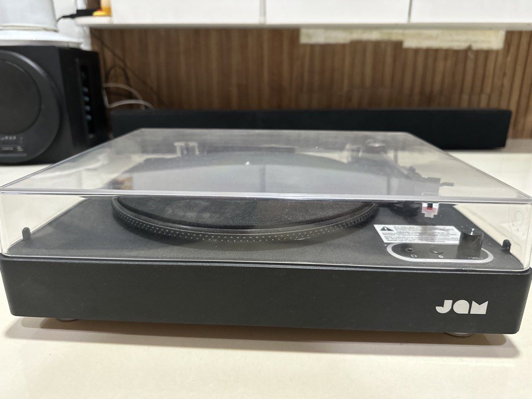 Turntable Record Vinyl Player with Dust Cover (Category: Other Audio Equipment) located in Quezon City. Submitted by aaathrifts (Listing ID 1456709108, Image 1). Description: - Includes clear dust cover - Features RCA output, Aux In, USB, and DC In ports - bluetooth - Perfect for playing your vinyl records .