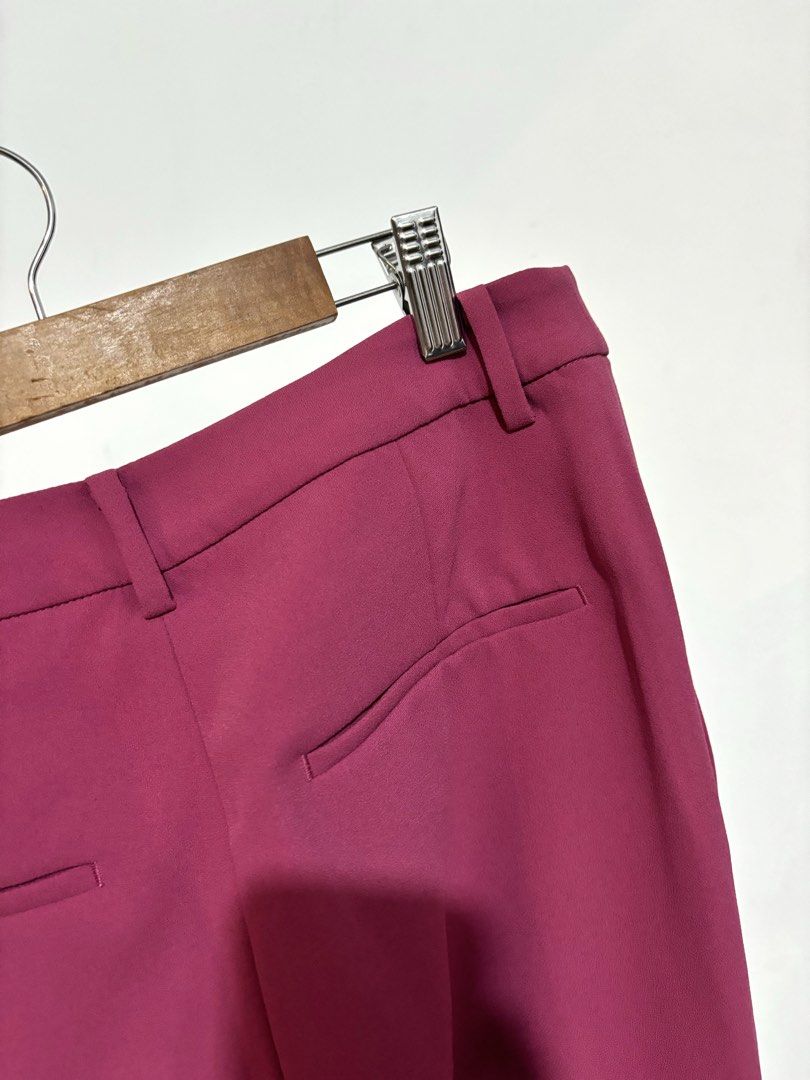 UNIQLO Drape Flare Trouser Pants (Pink) (Category: Other Bottoms) located in Bulacan. Submitted by janeeeeelleeeee (Listing ID 1456716405, Image 2). Description: - Vibrant pink UNIQLO wide leg pants - High-waisted design with a flattering flare - Made from a smooth polyester blend fabric - Versatile: perfect for dressing up or down - Ideal for both work and casual outings - 67cm on tag, W29-30, L38 ₱550.