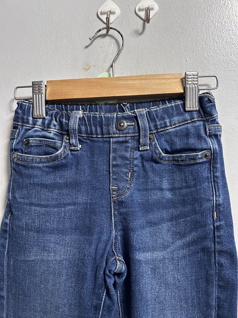 Uniqlo pants (Category: Babies & Kids Fashion) located in General Trias. Submitted by theosdeclutter (Listing ID 1456606762, Image 2). Description: - Brand: Uniqlo - Type: Jeans (Bottoms) - Color: Blue Denim - Size: 110 (fits height 105-115cm, suitable for ages 4-7 years) - Features: Elastic waistband, comfortable denim fabric.