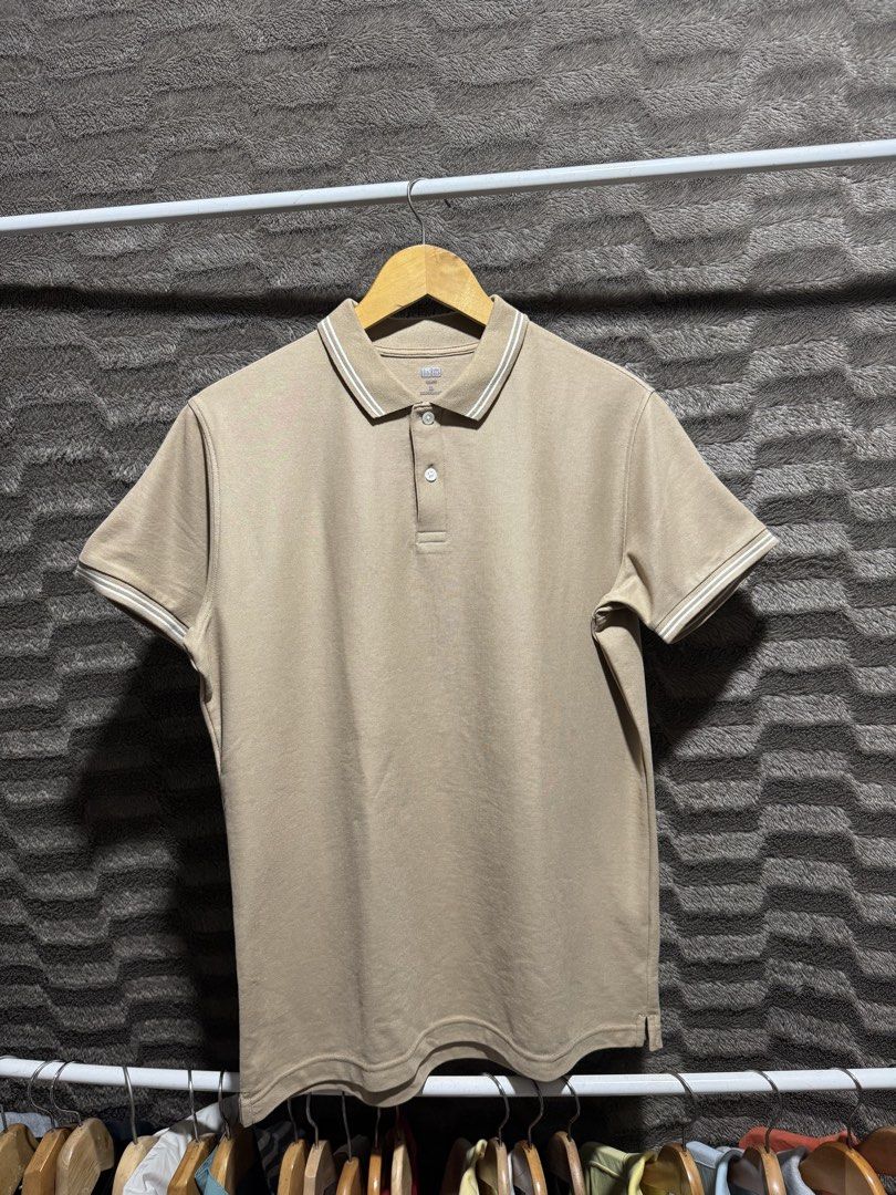 Uniqlo polo shirt (Category: Tshirts & Polo Shirts ) located in Bulacan. Submitted by OG_Domsthrift (Listing ID 1456640594, Image 1). Description: uniqlo polo shirt (brown) Pre-loved item As nex Slim fit Xl On tag 22x28 No issue Color rate:10/10.