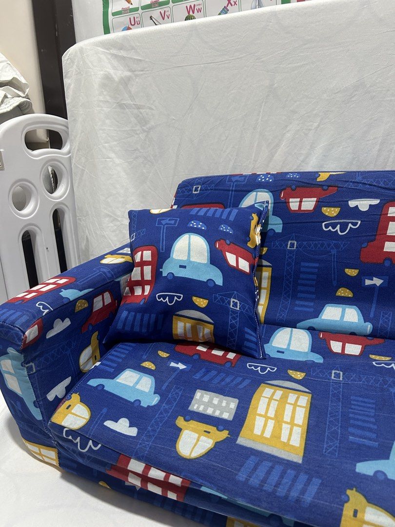 Uratex Kid Toddler Sofa bed (Category: Sofas) located in Pateros City. Submitted by cleanmycloset (Listing ID 1456714534, Image 2). Description: Preloved, unless stated brandnew. All items are declared AS IS. Pls manage your expectations. Can do tiiktokk checkout, courier apps, or self pick up. Payment first thru cashg or bank transfer. Coin is used for size comparison. .