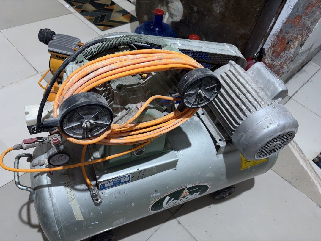Vespa Air Compressor with Hose (Category: Construction Tools & Equipment) located in Cavite. Submitted by boggsbognot (Listing ID 1456615556, Image 3). Description: - Vespa brand air compressor - 2HP - Equipped with pressure gauges for monitoring - Built-in wheels for effortless mobility - Test before buying - Pickup only in Imus Cavite.