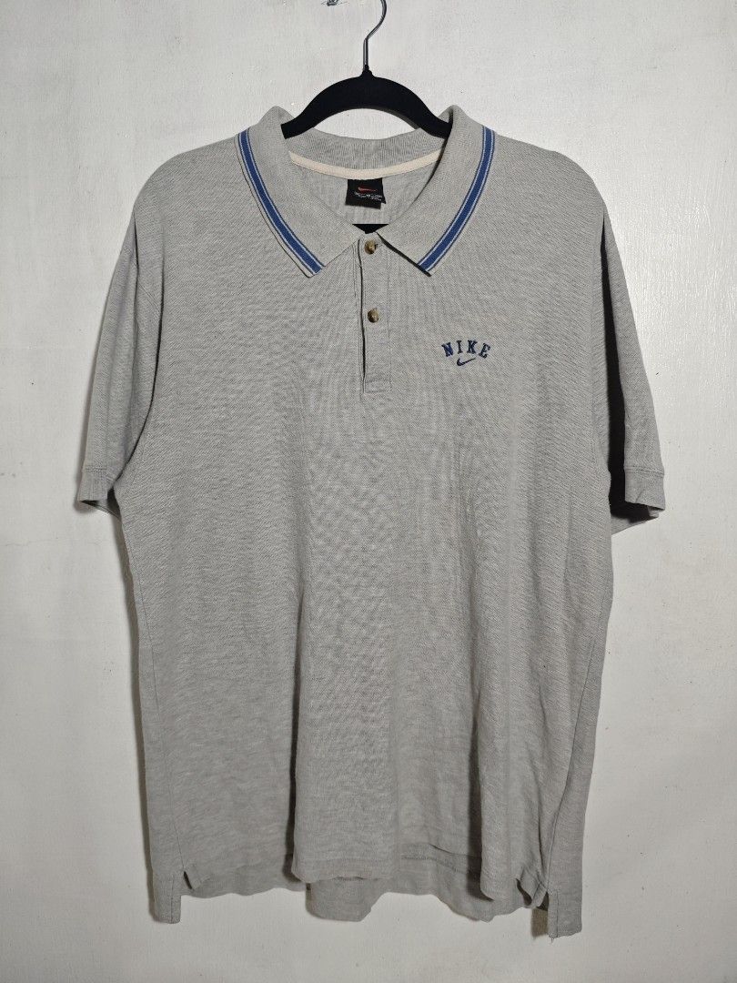 Vintage Nike Polo Shirt (Category: Formal Shirts) located in Dagupan City. Submitted by johnny.flips (Listing ID 1456713974, Image 1). Description: 22W 27.5L front 29L back 1 pinhole.