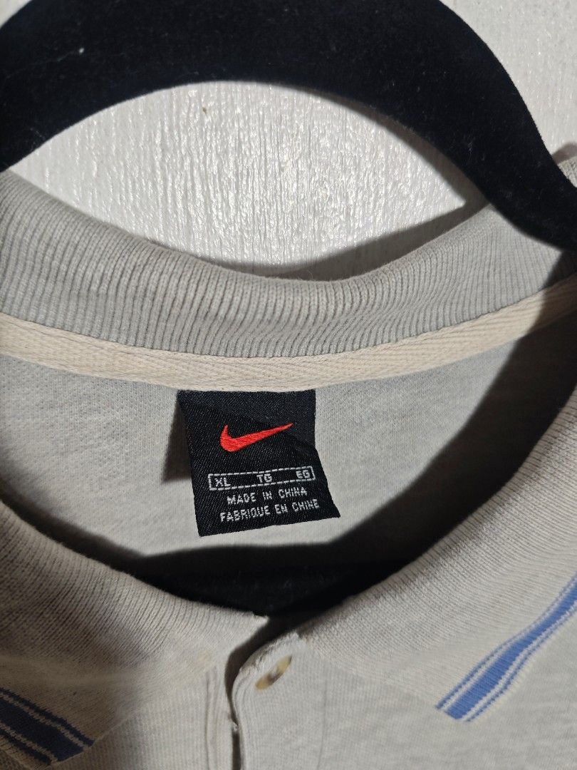 Vintage Nike Polo Shirt (Category: Formal Shirts) located in Dagupan City. Submitted by johnny.flips (Listing ID 1456713974, Image 2). Description: 22W 27.5L front 29L back 1 pinhole.