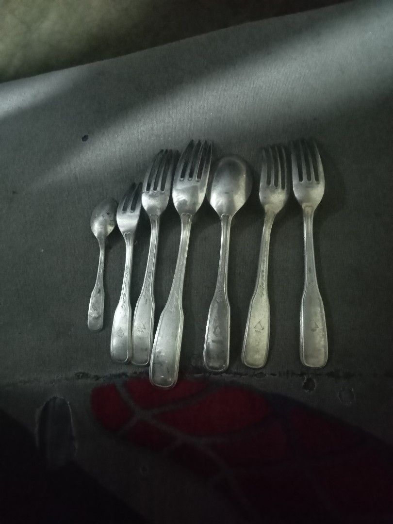 Vintage Spoons and Forks Set (Category: Dinnerware & Cutlery) located in Caloocan City. Submitted by arielrosario22 (Listing ID 1456715239, Image 3). Description: - Set includes 5 vintage forks and 3 vintage spoons. - Features a classic, timeless design. - Some pieces have unique markings. - Perfect for adding a vintage aesthetic to your table. - Sold as a complete bundle.300 each 6pcs.
